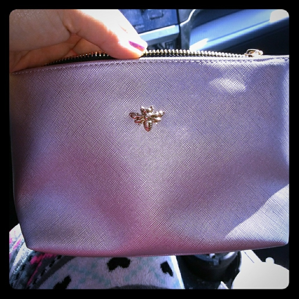 Free *Cosmetic bag* with New tote purchase!!!